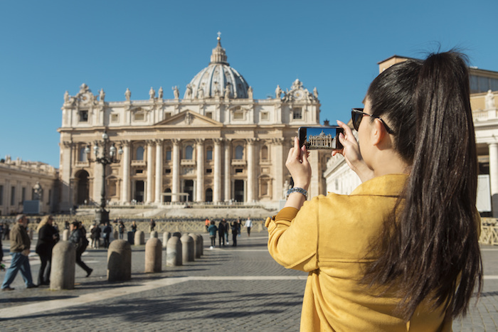 Girl taking photo in St Peters Square